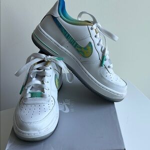 Nike White and Blue Sneakers with Athletic Style